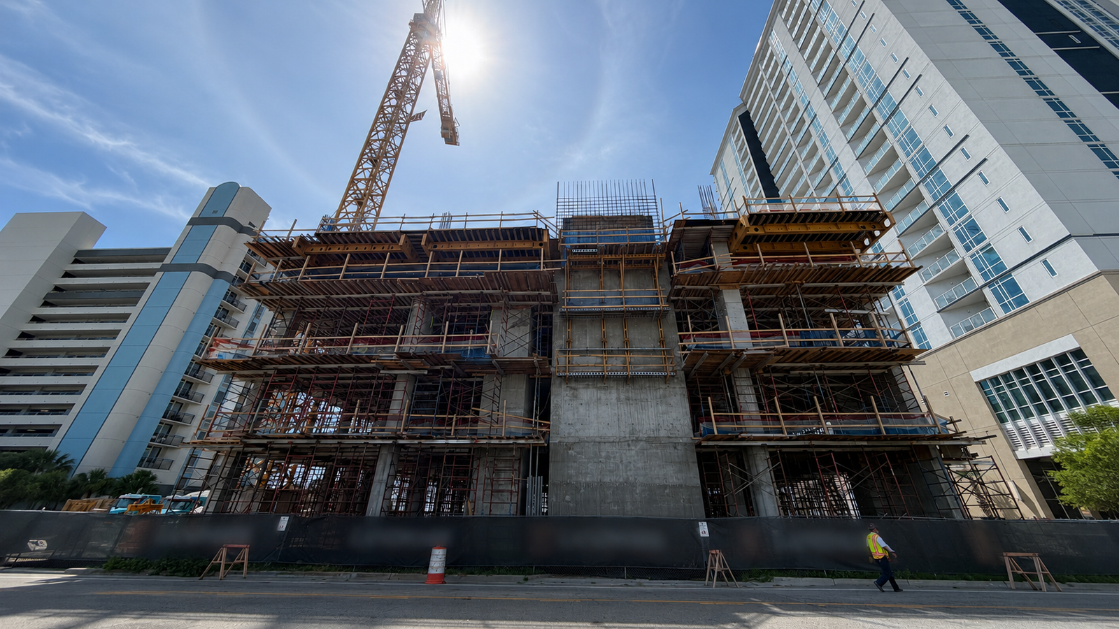 Multi-story commercial building under construction by Lakeshore Construction