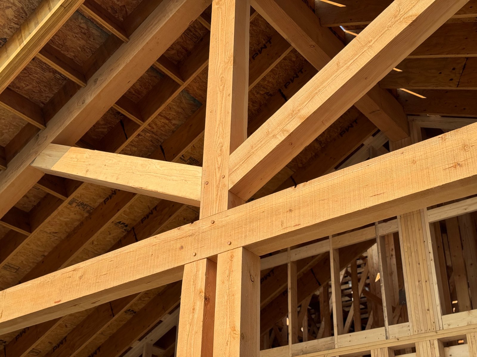 Timber-frame roof structure under construction